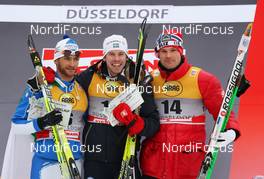 04.12.2010, Duesseldorf, Germany (GER): podium, l-r: 2nd Fulvio Scola (ITA), Fischer, One Way, Rottefella, Emil Joensson (SWE), Fischer, Salomon, Craft, Swix, Oystein Pettersen (NOR), Rossignol, Rottefella, Swix, KV+, Bliz  - FIS world cup cross-country, individual sprint, Duesseldorf (GER). www.nordicfocus.com. © Hemmersbach/NordicFocus. Every downloaded picture is fee-liable.