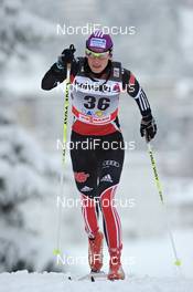11.12.2010, Davos, Switzerland (SUI): Nicole Fessel (GER), Rossignol, Rottefella, Alpina, One Way, adidas  - FIS world cup cross-country, 10km women, Davos (SUI). www.nordicfocus.com. Â© Felgenhauer/NordicFocus. Every downloaded picture is fee-liable.