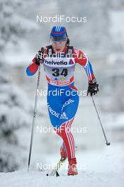 11.12.2010, Davos, Switzerland (SUI): Yulia Tchekaleva (RUS), Fischer, Alpina, Rottefella, Adidas, Swix  - FIS world cup cross-country, 10km women, Davos (SUI). www.nordicfocus.com. Â© Felgenhauer/NordicFocus. Every downloaded picture is fee-liable.