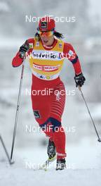 11.12.2010, Davos, Switzerland (SUI): Marit Bjoergen (NOR), Fischer, Rottefella, Swix  - FIS world cup cross-country, 10km women, Davos (SUI). www.nordicfocus.com. Â© Felgenhauer/NordicFocus. Every downloaded picture is fee-liable.