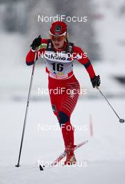 11.12.2010, Davos, Switzerland (SUI):  Ingvild Flugstad Oestberg (NOR), Madshus, Rottefella - FIS world cup cross-country, 10km women, Davos (SUI). www.nordicfocus.com. © Laiho/NordicFocus. Every downloaded picture is fee-liable.