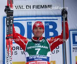 10.01.2010, Val di Fiemme, Italy (ITA): 1st Bill Demong (USA), Atomic  - FIS world cup nordic combined, individual gundersen HS134/10km, Val di Fiemme (ITA). www.nordicfocus.com. © Hemmersbach/NordicFocus. Every downloaded picture is fee-liable.