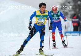 10.01.2010, Val di Fiemme, Italy (ITA): Jason Lamy-Chappuis (FRA), Fischer, Rottefella, just ahead of Pavel Churavy (CZE), Atomic  - FIS world cup nordic combined, individual gundersen HS134/10km, Val di Fiemme (ITA). www.nordicfocus.com. © Felgenhauer/NordicFocus. Every downloaded picture is fee-liable.
