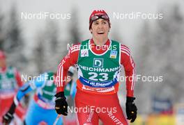 10.01.2010, Val di Fiemme, Italy (ITA): Tim Hug (SUI), Fischer, Salomon, adidas  - FIS world cup nordic combined, individual gundersen HS134/10km, Val di Fiemme (ITA). www.nordicfocus.com. © Felgenhauer/NordicFocus. Every downloaded picture is fee-liable.