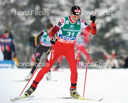 10.01.2010, Val di Fiemme, Italy (ITA): Mario Stecher (AUT), Fischer, Rottefella  - FIS world cup nordic combined, individual gundersen HS134/10km, Val di Fiemme (ITA). www.nordicfocus.com. © Felgenhauer/NordicFocus. Every downloaded picture is fee-liable.
