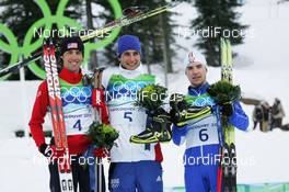 14.02.2010, Whistler, Canada (CAN): podium, l-r: Johnny Spillane (USA), Atomic, Jason Lamy-Chappuis (FRA), Fischer, Rottefella, Odlo, Alessandro Pittin (ITA), Fischer, Rottefella, Leki  - Olympic Winter Games Vancouver 2010, nordic combined, individual gundersen HS106/10km, Whistler (CAN). www.nordicfocus.com. © NordicFocus. Every downloaded picture is fee-liable.