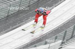 31.12.2009, Garmisch, Germany (GER): Roar Ljoekelsoey (NOR), Fischer  - FIS world cup ski jumping, four hills tournament, individual HS140, training, Garmisch (GER). www.nordicfocus.com. © Domanski/NordicFocus. Every downloaded picture is fee-liable.