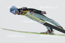 31.12.2009, Garmisch, Germany (GER): Kamil Stoch (POL), Fischer  - FIS world cup ski jumping, four hills tournament, individual HS140, training, Garmisch (GER). www.nordicfocus.com. © Domanski/NordicFocus. Every downloaded picture is fee-liable.