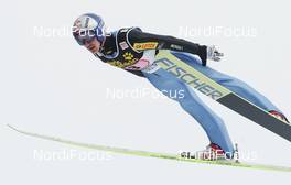 01.01.2010, Garmisch, Germany (GER): Adam Malysz (POL), Fischer  - FIS world cup ski jumping, four hills tournament, individual HS140, Garmisch (GER). www.nordicfocus.com. © Domanski/NordicFocus. Every downloaded picture is fee-liable.