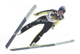 03.01.2010, Innsbruck, Austria (AUT): Thomas Morgenstern (AUT), Fisher  - FIS world cup ski jumping, four hills tournament, individual HS130, Innsbruck (AUT). www.nordicfocus.com. © Domanski/NordicFocus. Every downloaded picture is fee-liable.