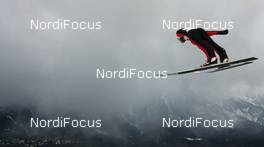 02.01.2010, Innsbruck, Austria (AUT): Bjoern Einar Romoeren (NOR), Atomic   - FIS world cup ski jumping, four hills tournament, individual HS130, training, Innsbruck (AUT). www.nordicfocus.com. © Domanski/NordicFocus. Every downloaded picture is fee-liable.