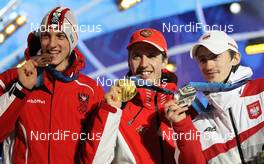 13.02.2010, Whistler, Canada (CAN):l-r: Gregor Schlierenzauer (AUT), Fischer , Simon Ammann (SUI), Fischer, Adam Malysz (POL), Fischer  - Olympic Winter Games Vancouver 2010, ski jumping, medals, Whistler (CAN). www.nordicfocus.com. © NordicFocus. Every downloaded picture is fee-l