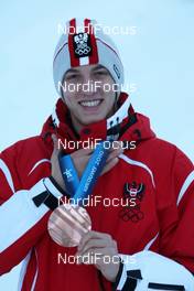 18.02.2010, Whistler, Canada (CAN): medal, Gregor Schlierenzauer (AUT), Fischer - Olympic Winter Games Vancouver 2010, ski jumping, medals, Whistler (CAN). www.nordicfocus.com. © NordicFocus. Every downloaded picture is fee-liable.