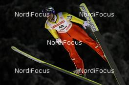 01.12.2010, Kuopio, Finland (FIN):   Thomas Morgenstern (AUT), Fischer - FIS world cup ski jumping, individual HS127, Kuopio (FIN). www.nordicfocus.com. © Laiho/NordicFocus. Every downloaded picture is fee-liable.