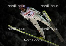 01.12.2010, Kuopio, Finland (FIN): Michael Neumayer (GER), Fischer  - FIS world cup ski jumping, individual HS127, Kuopio (FIN). www.nordicfocus.com. © Laiho/NordicFocus. Every downloaded picture is fee-liable.