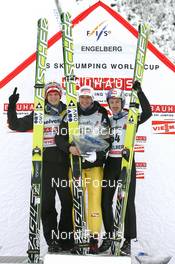 19.12.2010, Engelberg, Switzerland (SUI): (L-R): Thomas Morgenstern (AUT), Fischer, Andreas Kofler (AUT), Fischer, Adam Malysz (POL), Fischer - FIS world cup ski jumping, individual HS137, Engelberg (SUI). www.nordicfocus.com. © Manzoni/NordicFocus. Every downloaded picture is fee-liable.