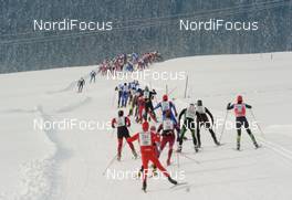 24.01.2010, Lienz, Austria (AUT): athletes on the way down - FIS Marathon Cup Dolomitenlauf, Lienz (AUT). www.nordicfocus.com. © Felgenhauer/NordicFocus. Every downloaded picture is fee-liable.