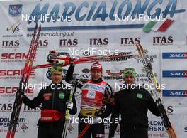 31.01.2010, Val di Fiemme, Italy (ITA): podium, l-r: Jerry Ahrlin (SWE), Oskar Svaerd (SWE), Atomic, Exel, Jorgen Aukland (NOR), Team Xtra, Rossignol, One Way  - FIS Marathon Cup Marcialonga, Val di Fiemme (ITA). www.nordicfocus.com. © Hemmersbach/NordicFocus. Every downloaded picture is fee-liable.