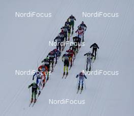 31.01.2010, Val di Fiemme, Italy (ITA): Leading group, Helicopter view, in front Jorgen Aukland (NOR), Team Xtra, Rossignol, One Way, in the right in front Jaak Mae (EST) - FIS Marathon Cup Marcialonga, Val di Fiemme (ITA). www.nordicfocus.com. © Hemmersbach/NordicFocus. Every downloaded picture is fee-liable.