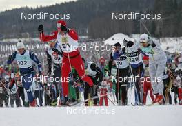 07.03.2010, Mora, Sweden (SWE): group, skiers going into the first uphill - Worldloppet / FIS Marathon Cup Vasaloppet, Mora (SWE). www.nordicfocus.com. © Hemmersbach/NordicFocus. Every downloaded picture is fee-liable.