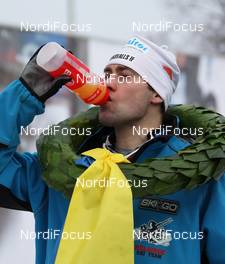 07.03.2010, Mora, Sweden (SWE): feature, todays winner Joergen Brink (SWE), Madshus, Swix, SkiGo drinking from the Enervit bottle after the race - Worldloppet / FIS Marathon Cup Vasaloppet, Mora (SWE). www.nordicfocus.com. © Hemmersbach/NordicFocus. Every downloaded picture is fee-liable.