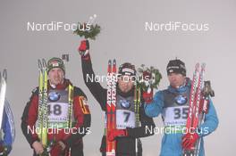 07.01.2011, Oberhof, Germany (GER): (L-R): Dominik Landertinger (AUT), Fischer, Rottefella, Leki, Benjamin Weger (SUI), Atomic, Leki, ODLO, Emil Hegle Svendsen (NOR), Madshus, Rottefella, Swix, Odlo - IBU world cup biathlon, sprint men, Oberhof (GER). www.nordicfocus.com. © Manzoni/NordicFocus. Every downloaded picture is fee-liable.