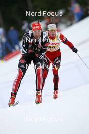 12.01.2011, Ruhpolding, Germany (GER): Alexander Wolf (GER), Fischer, Rottefella, Alpina, Leki adidas, Toko and Tarjei Boe (NOR), Fischer, Rottefella, Swix, ODLO - IBU world cup biathlon, individual men, Ruhpolding (GER). www.nordicfocus.com. © Manzoni/NordicFocus. Every downloaded picture is fee-liable.