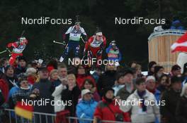 14.01.2011, Ruhpolding, Germany (GER): Emil Hegle Svendsen (NOR), Madshus, Rottefella, Swix, Odlo, Tim Burke (USA), Rossignol, Rottefella, Swix, adidas - IBU world cup biathlon, sprint men, Ruhpolding (GER). www.nordicfocus.com. © Manzoni/NordicFocus. Every downloaded picture is fee-liable.