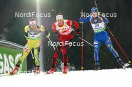 14.01.2011, Ruhpolding, Germany (GER): Pavol Hurajt (SVK), Fischer, Rottefella, Alpina, One Way, Tarjei Boe (NOR), Fischer, Rottefella, Swix, ODLO, Carl-Johan Bergman (SWE), Rossignol, Rottefella, Leki, adidas - IBU world cup biathlon, sprint men, Ruhpolding (GER). www.nordicfocus.com. © Manzoni/NordicFocus. Every downloaded picture is fee-liable.