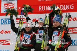 15.01.2011, Ruhpolding, Germany (GER): L-R: Andrea Henkel (GER), Fischer, Rottefella, Exel, adidas, Toko, Tora Berger (NOR), Fischer, Rottefella, Odlo, Magdalena Neuner (GER), Fischer, Rottefella, Exel, adidas - IBU world cup biathlon, sprint women, Ruhpolding (GER). www.nordicfocus.com. © Manzoni/NordicFocus. Every downloaded picture is fee-liable.