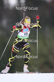 15.01.2011, Ruhpolding, Germany (GER): Anais Bescond (FRA), Madshus, Rottefella, Swix, OneWay - IBU world cup biathlon, sprint women, Ruhpolding (GER). www.nordicfocus.com. © Manzoni/NordicFocus. Every downloaded picture is fee-liable.