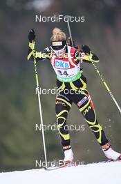 15.01.2011, Ruhpolding, Germany (GER): Marie Dorin (FRA), Rossignol, Rottefella, OneWay - IBU world cup biathlon, sprint women, Ruhpolding (GER). www.nordicfocus.com. © Manzoni/NordicFocus. Every downloaded picture is fee-liable.