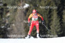 22.01.2011, Antholz, Italy (ITA): Yinghui Xu (CHN), Fischer, Salomon, Swix, adidas - IBU world cup biathlon, relay women, Antholz (ITA). www.nordicfocus.com. © Manzoni/NordicFocus. Every downloaded picture is fee-liable.