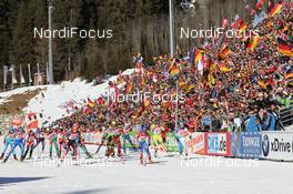 22.01.2011, Antholz, Italy (ITA): Biathlon Feature: Start of women's relay in front of a cheering crowd - IBU world cup biathlon, relay women, Antholz (ITA). www.nordicfocus.com. © Manzoni/NordicFocus. Every downloaded picture is fee-liable.