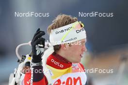 20.01.2011, Antholz, Italy (ITA): Tarjei Boe (NOR), Fischer, Rottefella, Swix, ODLO - IBU world cup biathlon, sprint men, Antholz (ITA). www.nordicfocus.com. © Manzoni/NordicFocus. Every downloaded picture is fee-liable.