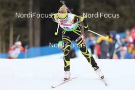 21.01.2011, Antholz, Italy (ITA): Marie Dorin (FRA), Rossignol, Rottefella, OneWay - IBU world cup biathlon, sprint women, Antholz (ITA). www.nordicfocus.com. © Manzoni/NordicFocus. Every downloaded picture is fee-liable.