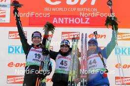 21.01.2011, Antholz, Italy (ITA): L-R: Anastasiya Kuzmina (SVK), Fischer, Salomon, Exel, Tora Berger (NOR), Fischer, Rottefella, Odlo, Olga Zaitseva (RUS), Madshus, Rottefella, Alpina, Swix, adidas - IBU world cup biathlon, sprint women, Antholz (ITA). www.nordicfocus.com. © Manzoni/NordicFocus. Every downloaded picture is fee-liable.