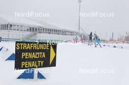 19.01.2011, Antholz, Italy (ITA): Biathlon Feature: Track sign with competing athletes and the VIP-tent in the back - IBU world cup biathlon, training, Antholz (ITA). www.nordicfocus.com. © Manzoni/NordicFocus. Every downloaded picture is fee-liable.