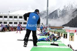 19.01.2011, Antholz, Italy (ITA): Biathlon Feature: Track marshall cleans the shooting range - IBU world cup biathlon, training, Antholz (ITA). www.nordicfocus.com. © Manzoni/NordicFocus. Every downloaded picture is fee-liable.
