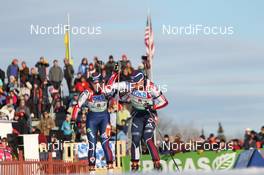05.02.2011, Presque Isle, United States of America (USA): Haley Johnson (USA), Rossignol, Rottefella, Exel, adidas, Jay Hakkinen (USA), Rossignol, Rottefella, Swix, adidas - IBU world cup biathlon, relay mixed, Presque Isle (USA). www.nordicfocus.com. © Manzoni/NordicFocus. Every downloaded picture is fee-liable.