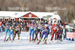 05.02.2011, Presque Isle, United States of America (USA): Start of the race with Andreja Mali (SLO), Fischer, Rottefella, Alpina, Leki in the lead - IBU world cup biathlon, relay mixed, Presque Isle (USA). www.nordicfocus.com. © Manzoni/NordicFocus. Every downloaded picture is fee-liable.
