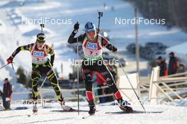 05.02.2011, Presque Isle, United States of America (USA): Kathrin Hitzer (GER), Madshus, Rottefella, Swix, adidas laeds Marie Laure Brunet (FRA), Rossignol, Rottefella, Swix - IBU world cup biathlon, relay mixed, Presque Isle (USA). www.nordicfocus.com. © Manzoni/NordicFocus. Every downloaded picture is fee-liable.