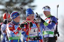 05.02.2011, Presque Isle, United States of America (USA): Natalia Guseva (RUS), Atomic, OneWay, adidas, Ivan Tcherezov (RUS), Fischer, Rottefella, Swix, adidas, Jakov Fak (SLO), Fischer, Rottefella, Alpina, Swix - IBU world cup biathlon, relay mixed, Presque Isle (USA). www.nordicfocus.com. © Manzoni/NordicFocus. Every downloaded picture is fee-liable.