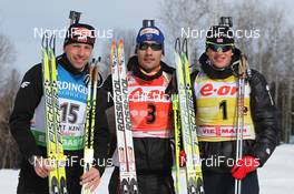 13.02.2011, Fort Kent, United States of America (USA): (L-R): Tomasz Sikora (POL), Fischer, Rottefella,  OneWay, Martin Fourcade (FRA), Rossignol, Rottefella, OneWay, Odlo, Tarjei Boe (NOR), Fischer, Rottefella, Swix, ODLO - IBU world cup biathlon, mass men, Fort Kent (USA). www.nordicfocus.com. © Manzoni/NordicFocus. Every downloaded picture is fee-liable.