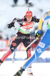 13.02.2011, Fort Kent, United States of America (USA): Sabrina Buchholz (GER), Rossignol, Rottefella, Leki, adidas - IBU world cup biathlon, mass women, Fort Kent (USA). www.nordicfocus.com. © Manzoni/NordicFocus. Every downloaded picture is fee-liable.