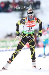 13.02.2011, Fort Kent, United States of America (USA): Marie Dorin (FRA), Rossignol, Rottefella, OneWay - IBU world cup biathlon, mass women, Fort Kent (USA). www.nordicfocus.com. © Manzoni/NordicFocus. Every downloaded picture is fee-liable.
