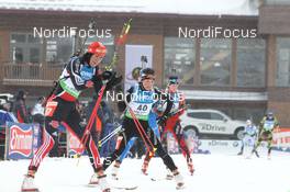 12.02.2011, Fort Kent, United States of America (USA): Sabrina Buchholz (GER), Rossignol, Rottefella, Leki, adidas, Selina Gasparin (SUI), Rossignol, Rottefella, Leki, ODLO - IBU world cup biathlon, pursuit women, Fort Kent (USA). www.nordicfocus.com. © Manzoni/NordicFocus. Every downloaded picture is fee-liable.