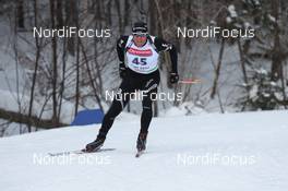 10.02.2011, Fort Kent, United States of America (USA): Matthias Simmen (SUI), Rossignol, Rottefella, Exel, ODLO - IBU world cup biathlon, sprint men, Fort Kent (USA). www.nordicfocus.com. © Manzoni/NordicFocus. Every downloaded picture is fee-liable.