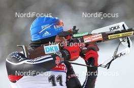 10.02.2011, Fort Kent, United States of America (USA): Michael Greis (GER), Madshus, Rottefella, OneWay, adidas - IBU world cup biathlon, sprint men, Fort Kent (USA). www.nordicfocus.com. © Manzoni/NordicFocus. Every downloaded picture is fee-liable.