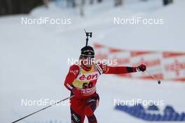 10.02.2011, Fort Kent, United States of America (USA): Tarjei Boe (NOR), Fischer, Rottefella, Swix, ODLO - IBU world cup biathlon, sprint men, Fort Kent (USA). www.nordicfocus.com. © Manzoni/NordicFocus. Every downloaded picture is fee-liable.